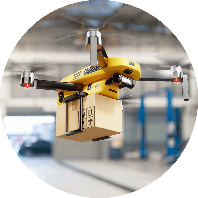 Eine gelbe Drohne, die ein kleines braunes Paket trägt, schwebt in einem Innenraum, wobei der Hintergrund unscharf ist und auf ein Lagerhaus oder ein Vertriebszentrum hindeutet.